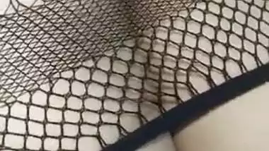 Hot Desi babe in fishnet dress has her pussy XXX rubbed by lover