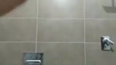 Shower porn video of the young Desi girlfriend with thick eyebrows