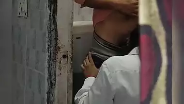 An 18 yr old college girl gives a blowjob in the washroom