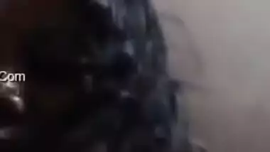 Desi mom with serious face sits before camera topless in solo sex clip