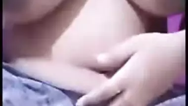 Desi gal with pretty face shows off her awesome XXX tits on cam