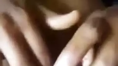 Amateur Desi babe rubs her XXX clitoris while cameraman is fingering ass