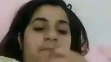 Indian babe pulls T-shirt up exposing XXX round boobs and nipples