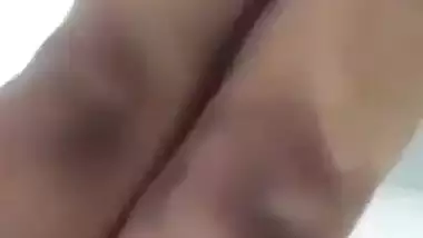 Beautiful desi girl lifting top to reveal sexy boobs