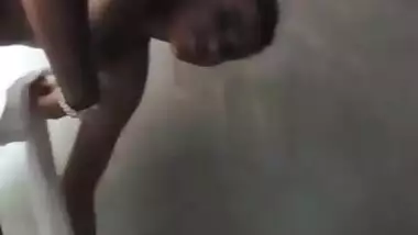 Cute village girl bathing