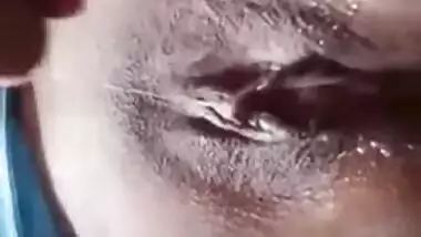 Desi exposes naked pussy without any sense of shame and touches it