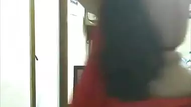 Horny desi bhabhi showing boobs and fingering pussy in red saree