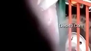 Voyeur films a man who hugs Desi babe and feels up her XXX boobs