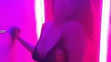 Enticing young woman reveals private parts posing in XXX lingerie