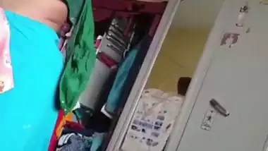 Grandmother wearing blouse and showing naked boobs