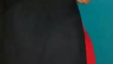 Desi female in a long black skirt exposes legs and boobies in sex show